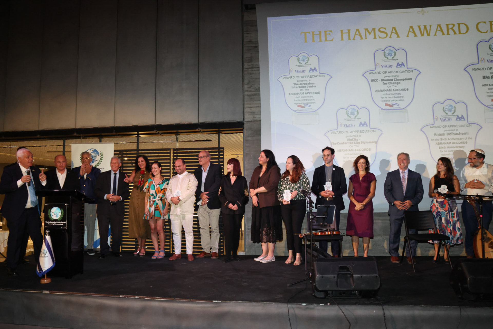 Guests and honorees on stage at the Hamsa Award ceremony